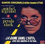 LEGRAND Michel - La dame dans l'auto avec des lunettes et un fusil